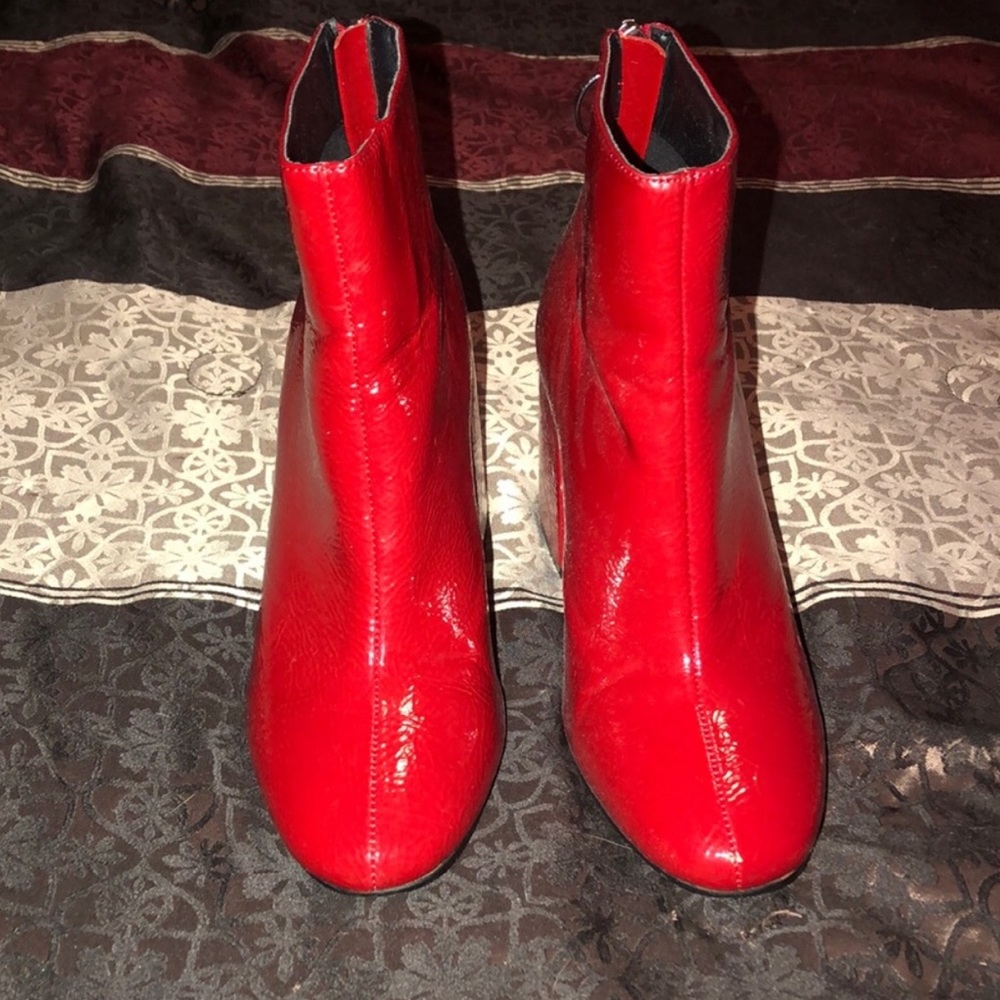 Red ankle boots.